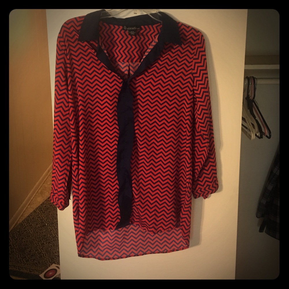 3 quarter sleeves. Royal blue/red chevron print