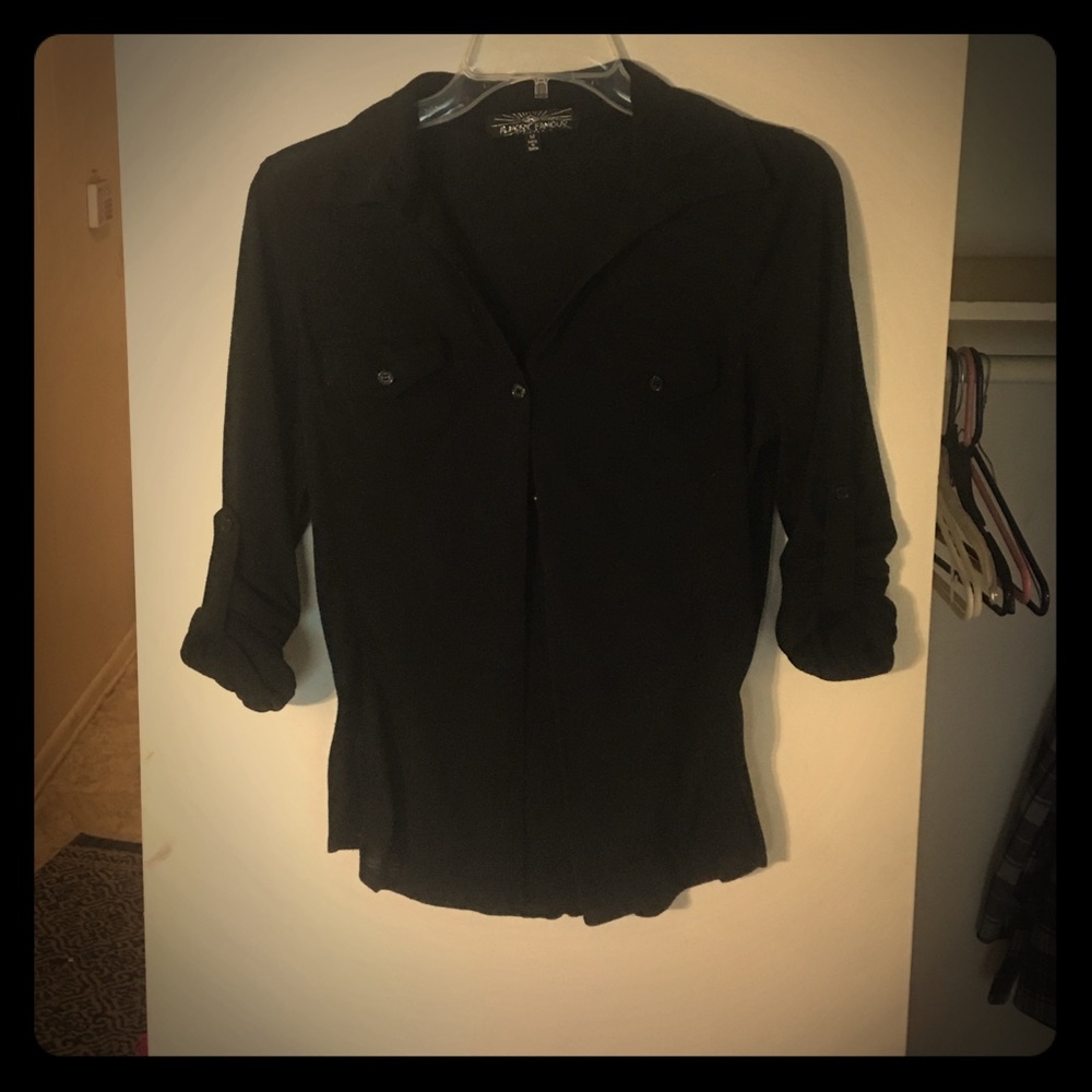 3 quarter sleeves. Black button down