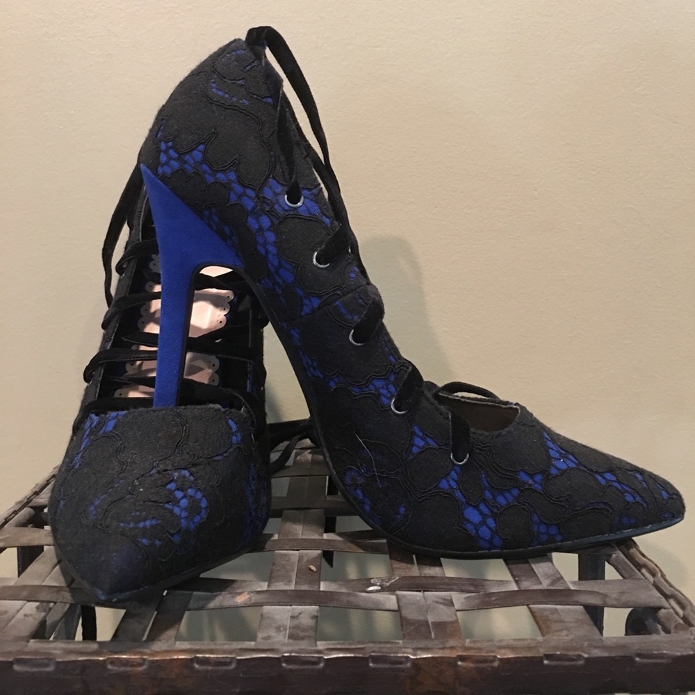 Never worn, black and blue heels!