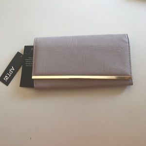 Nude and gold wallet