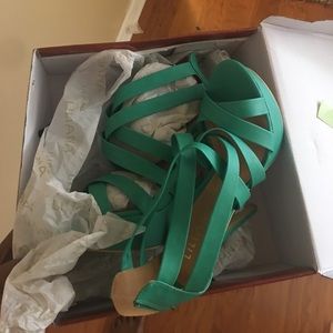 Never worn teal heels from agaci