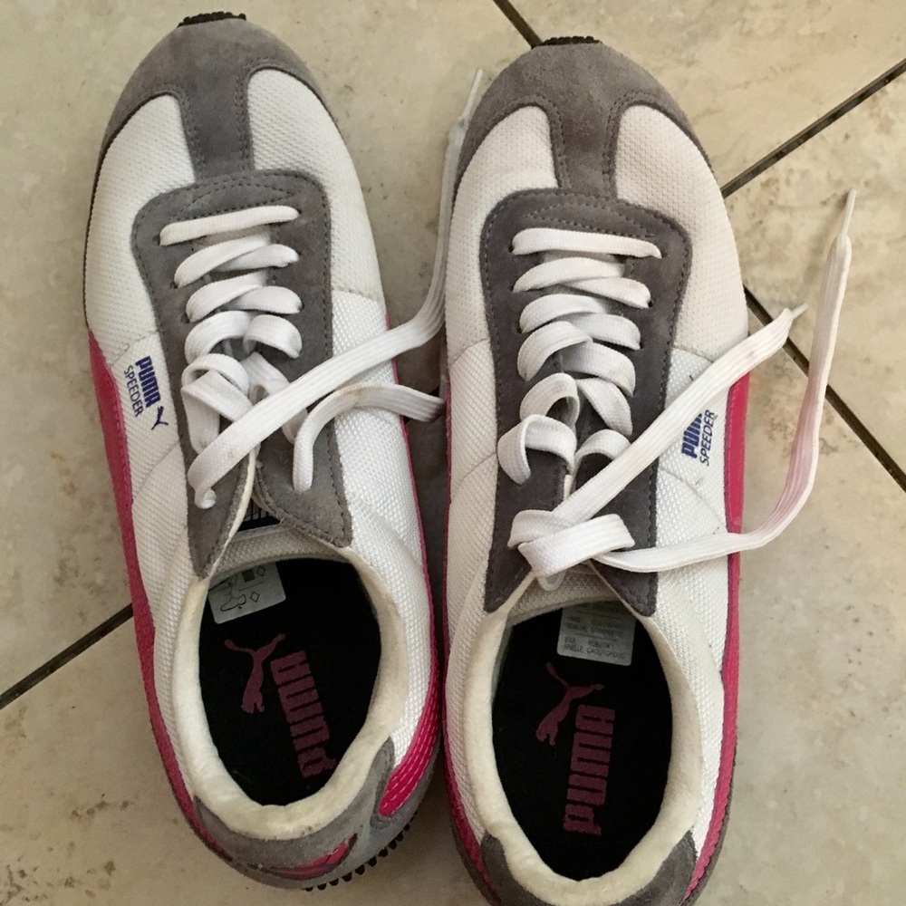 Puma woman's pink, white and purple running shoes