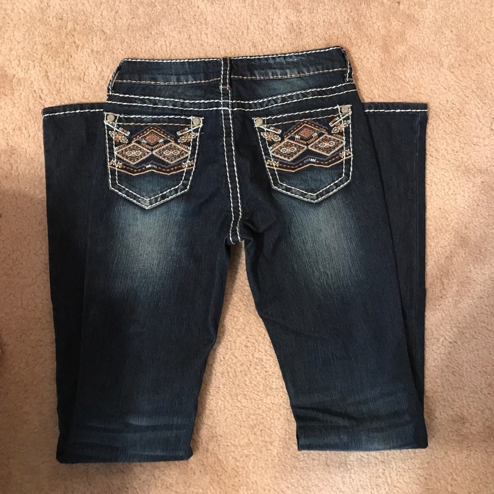 Stitched dark wash jeans