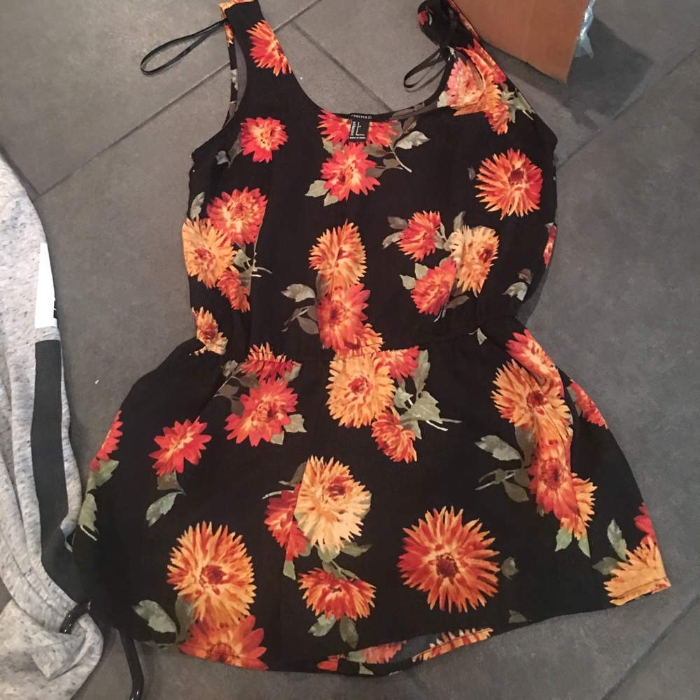 Black romper with floral pattern!