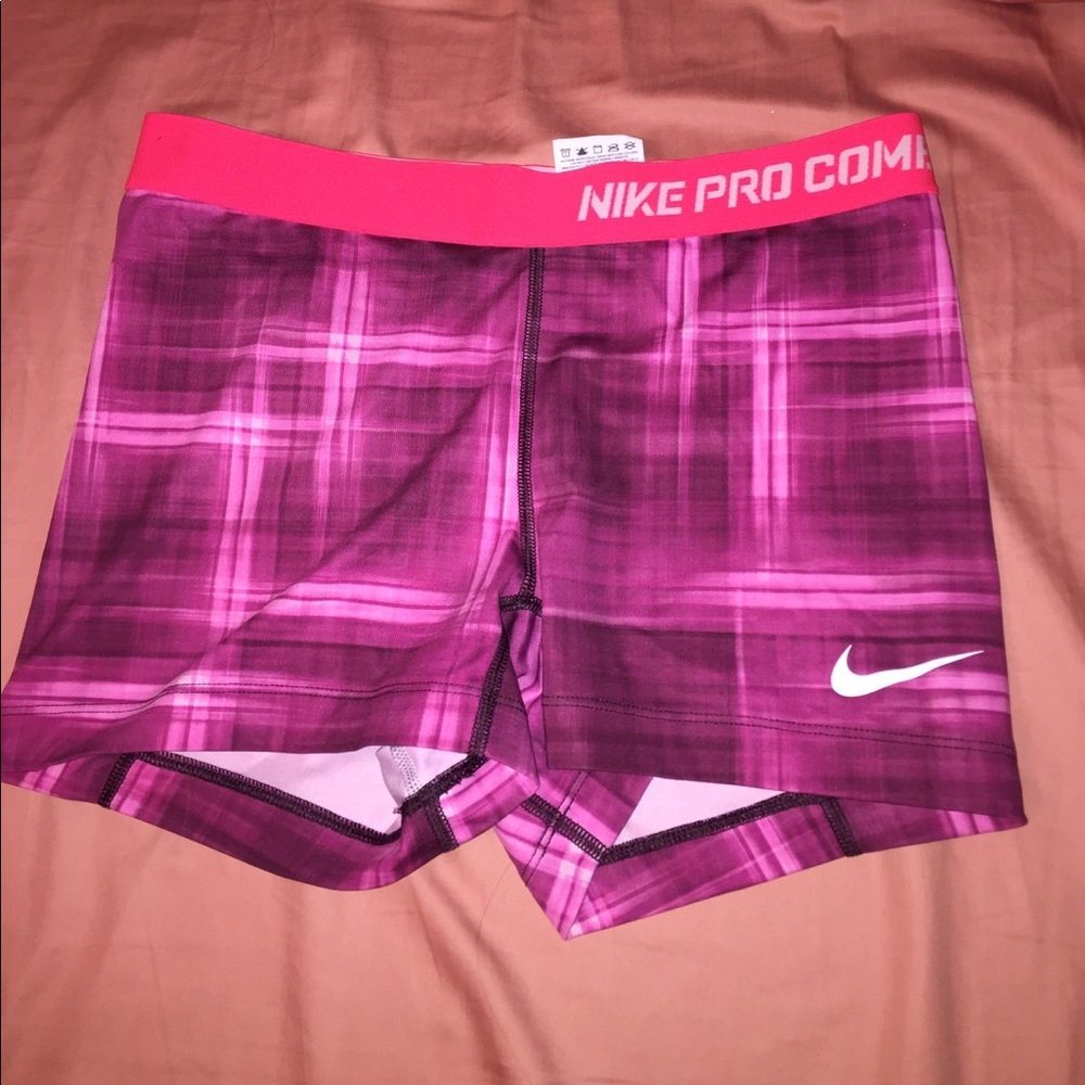 Pink Nike pro combat