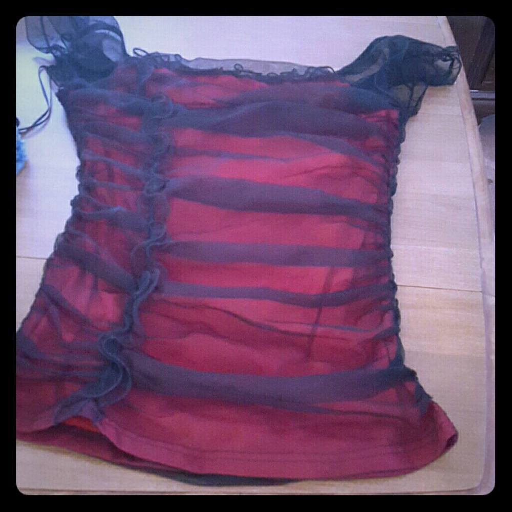 Red with black ruffled shirt