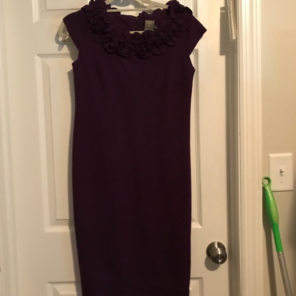 Purple dress with flowers around the neck