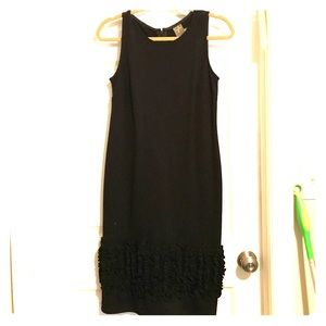 Black dress with ruffles at the bottom