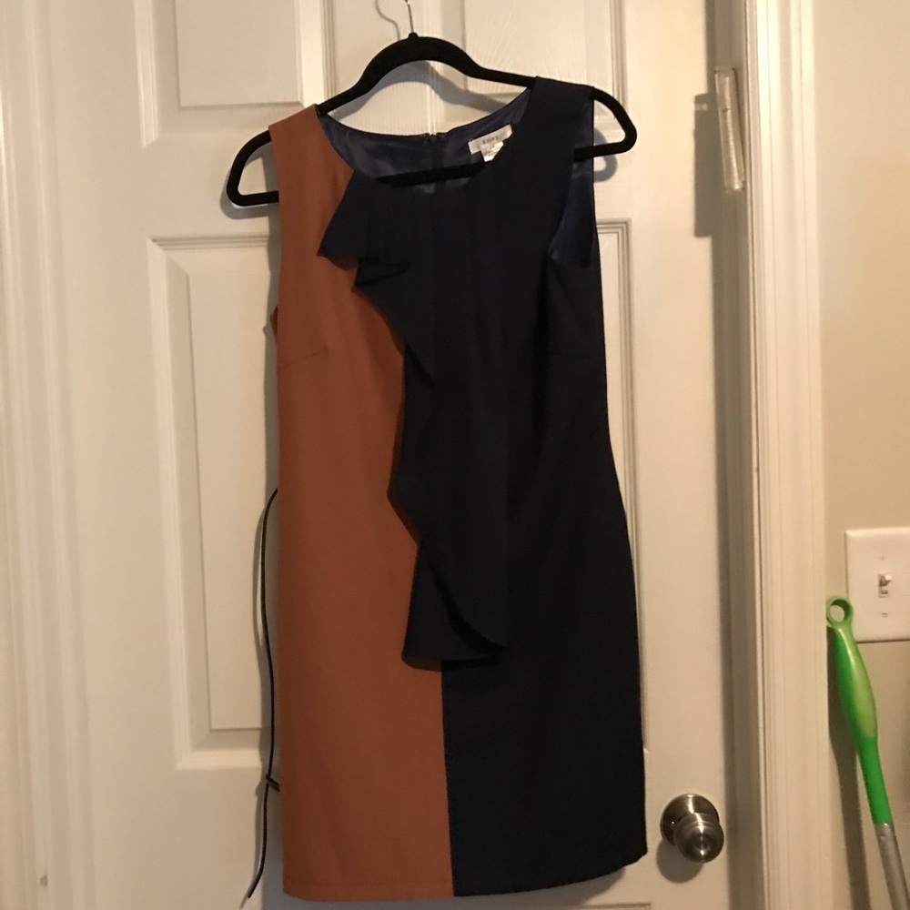 Navy and tan dress with ruffles down the middle