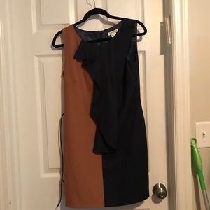 Navy and tan dress with ruffles down the middle