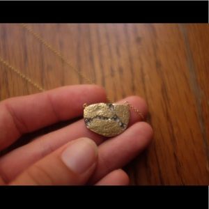 18 karat gold pendant with diamonds inset