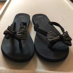 Gilly Hicks flip flops.