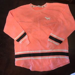 Pink ,black ,and white sweater