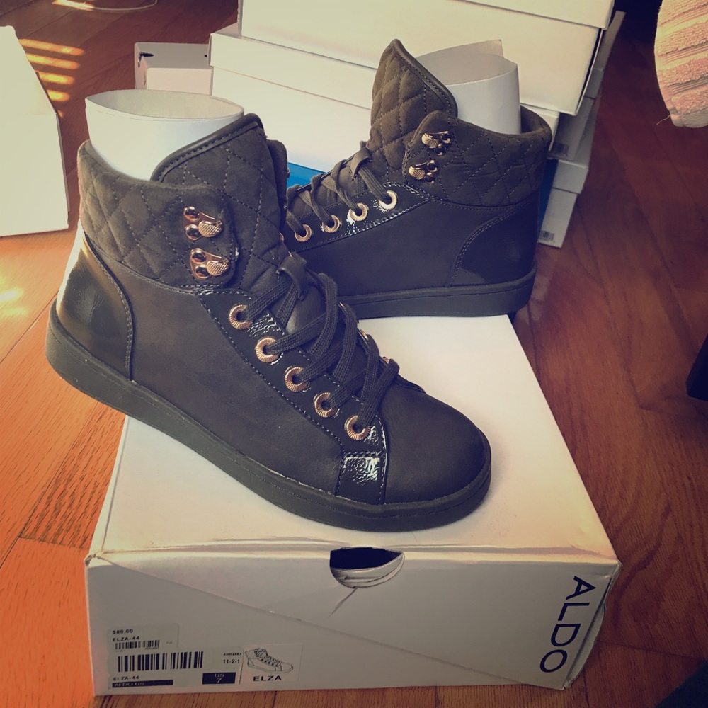 Army green high top sneaker.