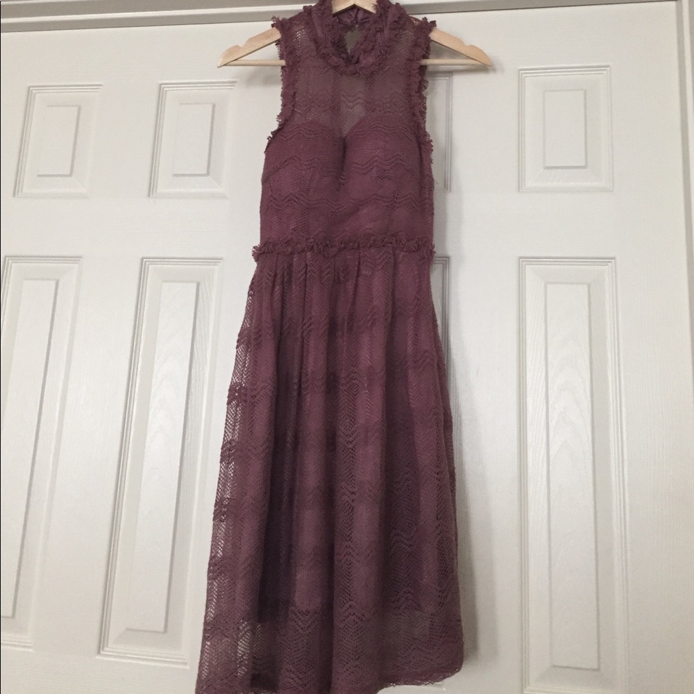 Open back, mesh overlay high neck dress by Minuet.