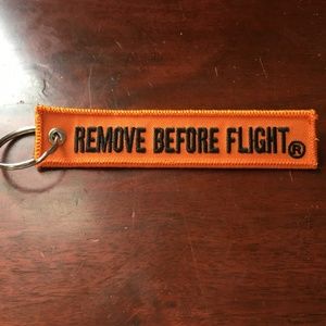 Orange Remove Before Flight Keychain