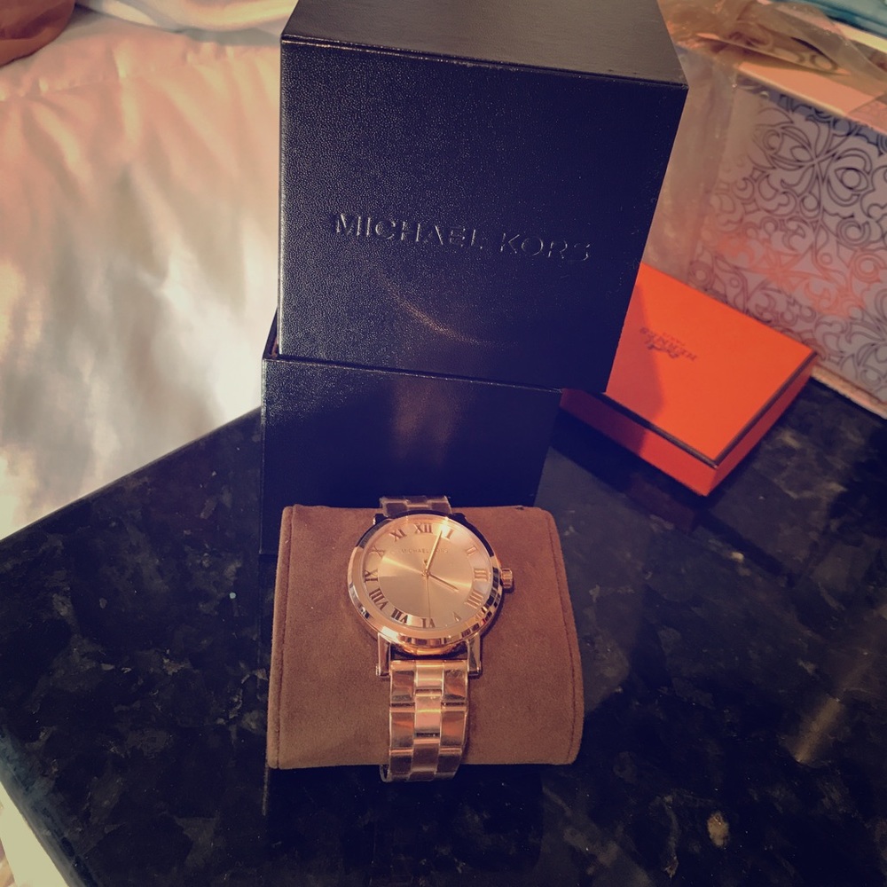 Rose gold Michael Kors watch.