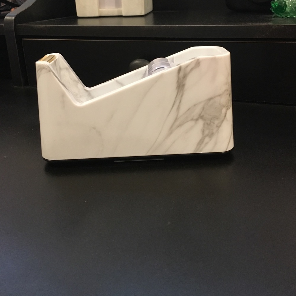 Marble tape dispenser