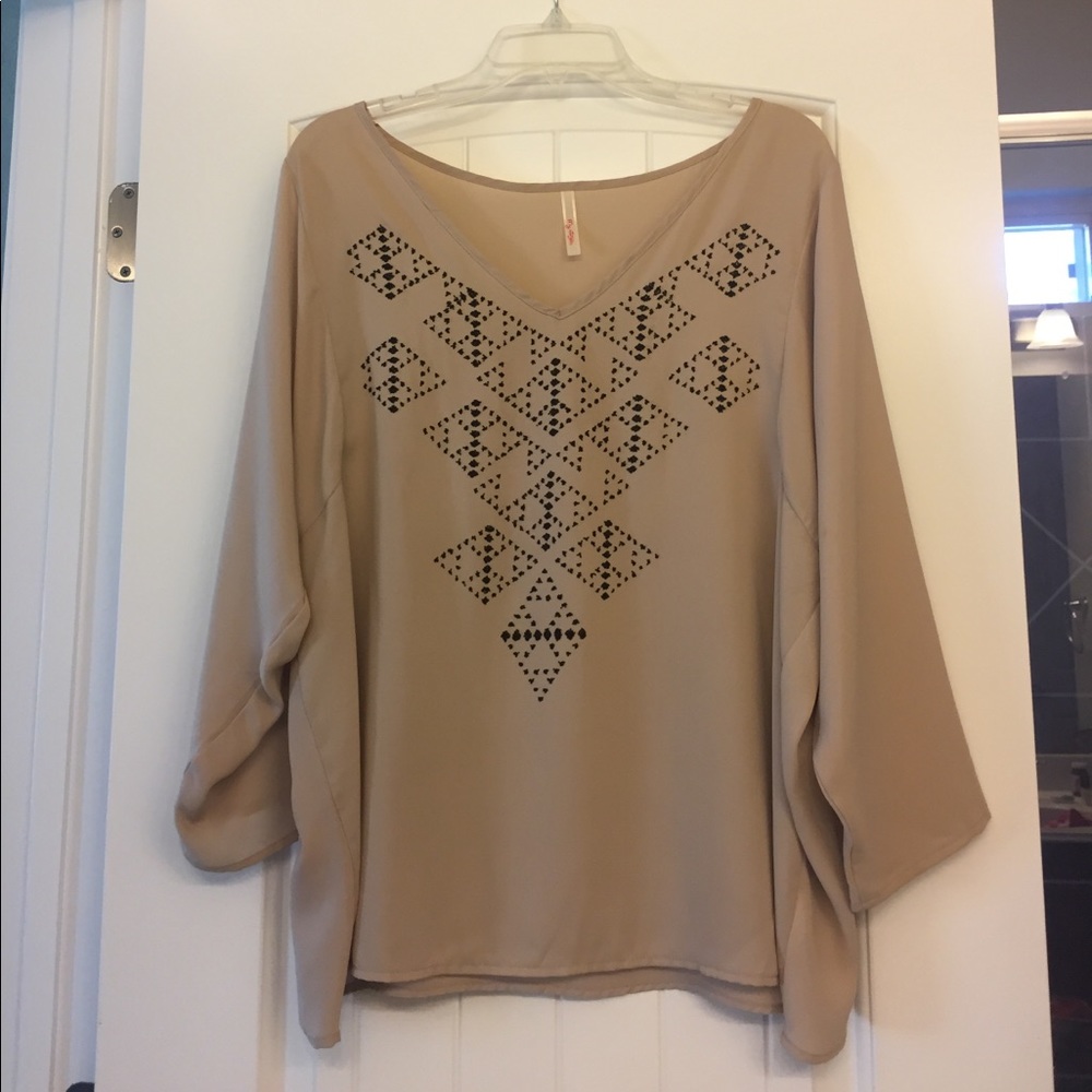 Tan and black blouse