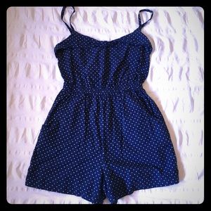 Navy romper with white polka dots