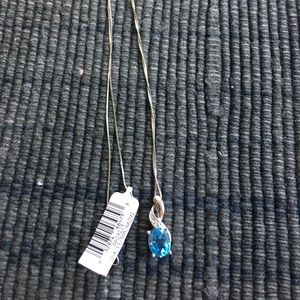 10kt white gold necklace with blue topaz