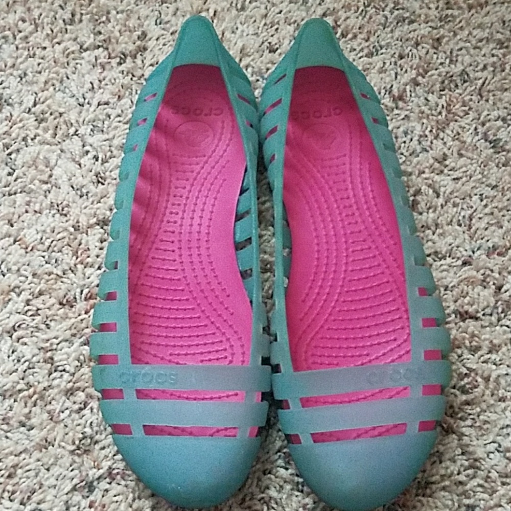 Pink and teal crocs