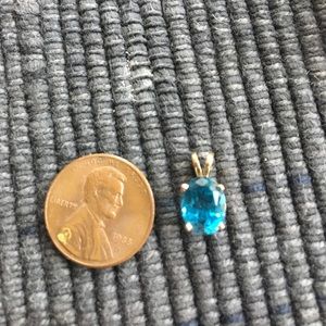 Topaz pendant in 14 kt gold