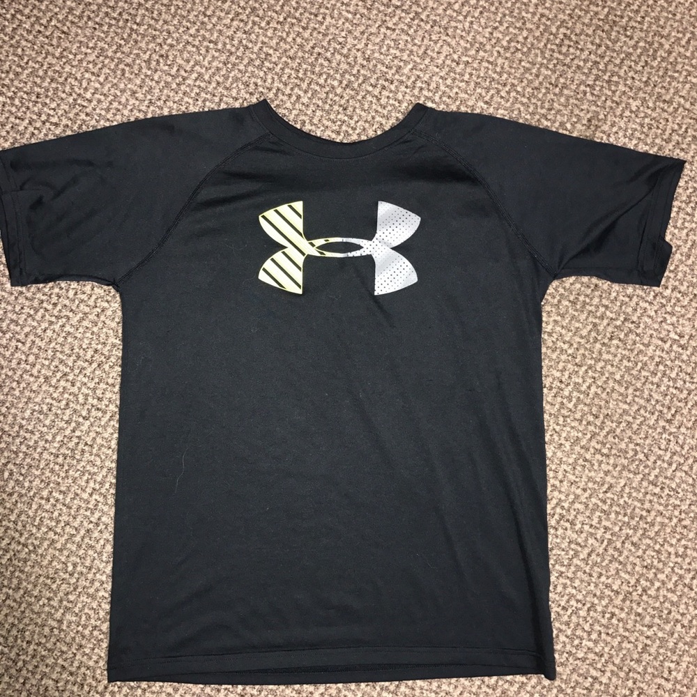 Under Armor dry fit material but loose fitting