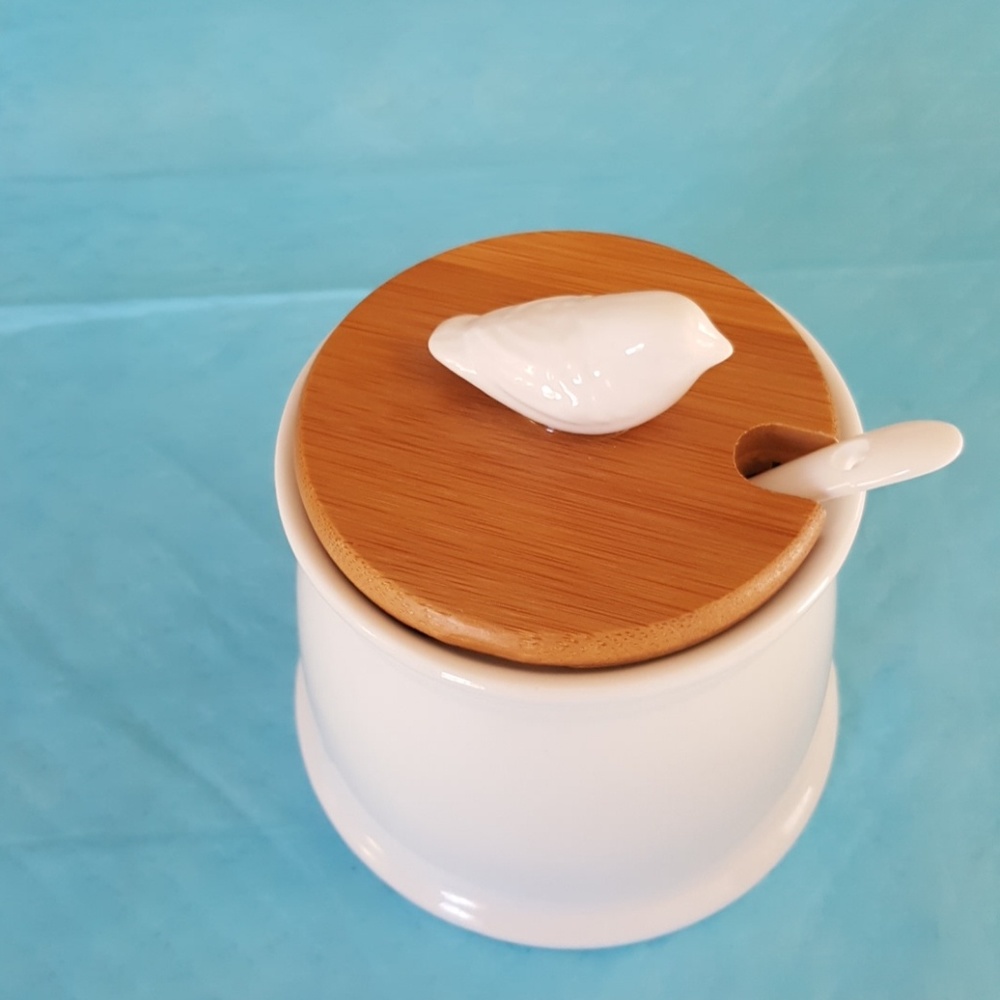 Glass bird sugar container