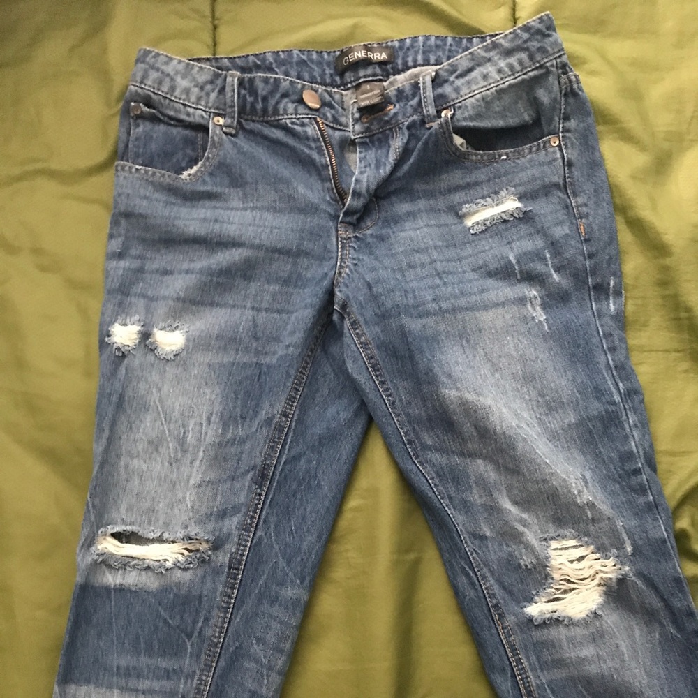 Two pairs of ripped jeans each 35 or both for 50.