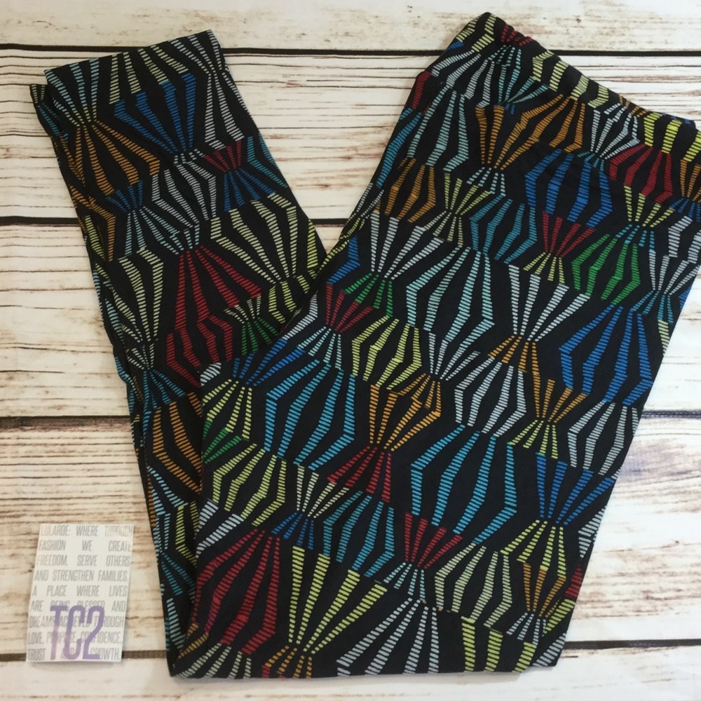 TC2 NWT black background with color splash
