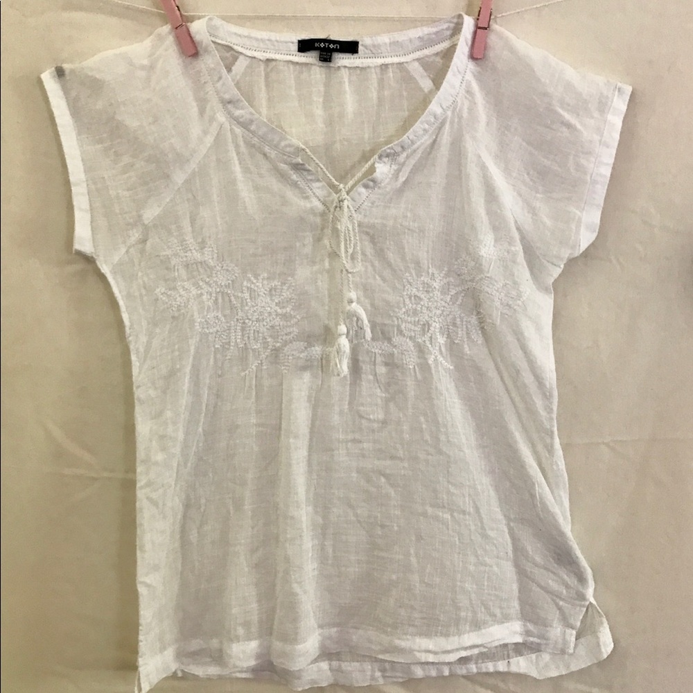Breezy White Blouse with Embroidered Detail
