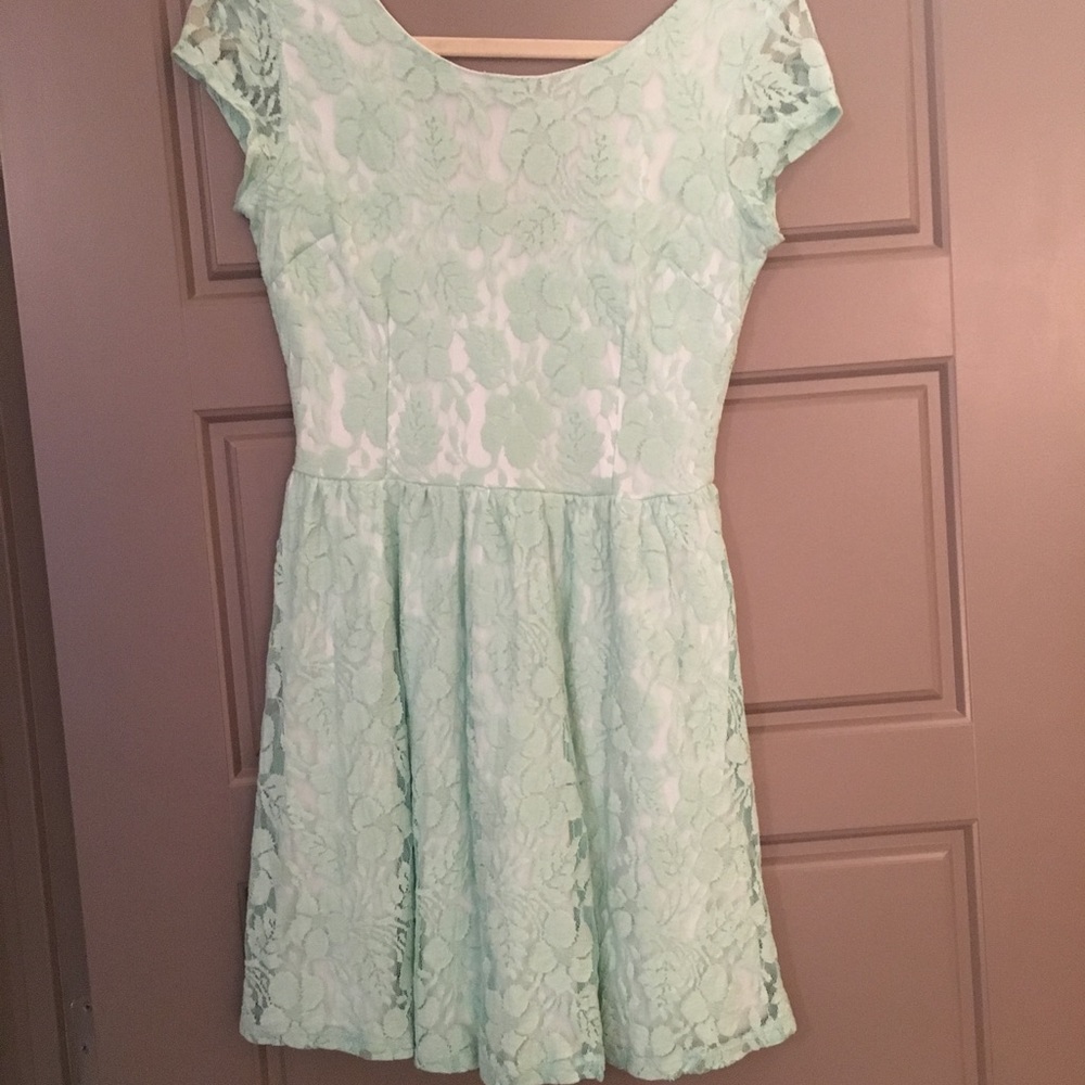 Sea foam green lace dress.