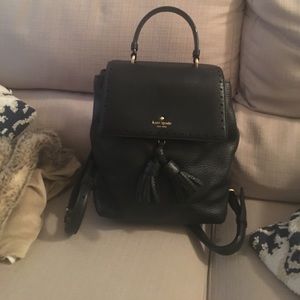 Kate spade pebbled leather backpack w/ tassels.