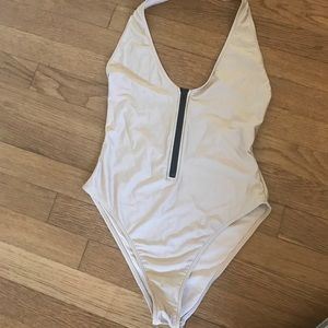 Good one piece with black zipper front