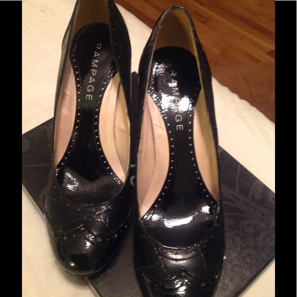Gently used black pumps