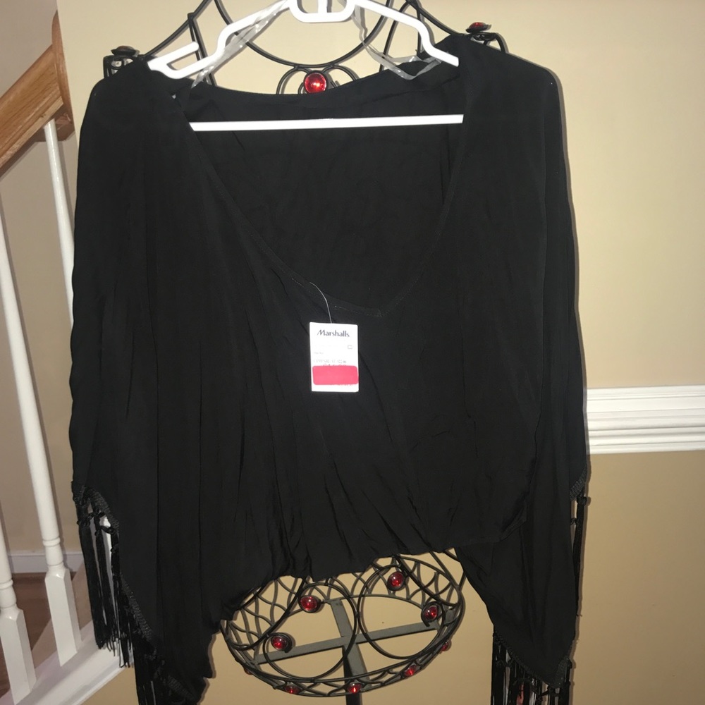 Black shirt, long sleeves/off the shoulder