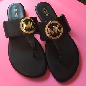 Micheal Kors black flip flops