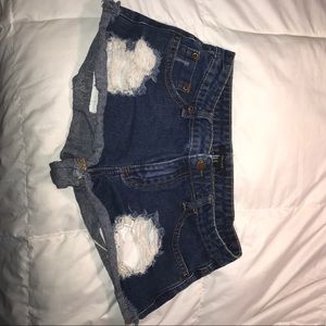Dark wash denim cut offs w/ rips