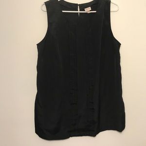 Black sleeveless top with pleated front detail