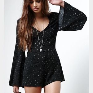 P.S. Erin Wasson Black Bell Sleeve Romper