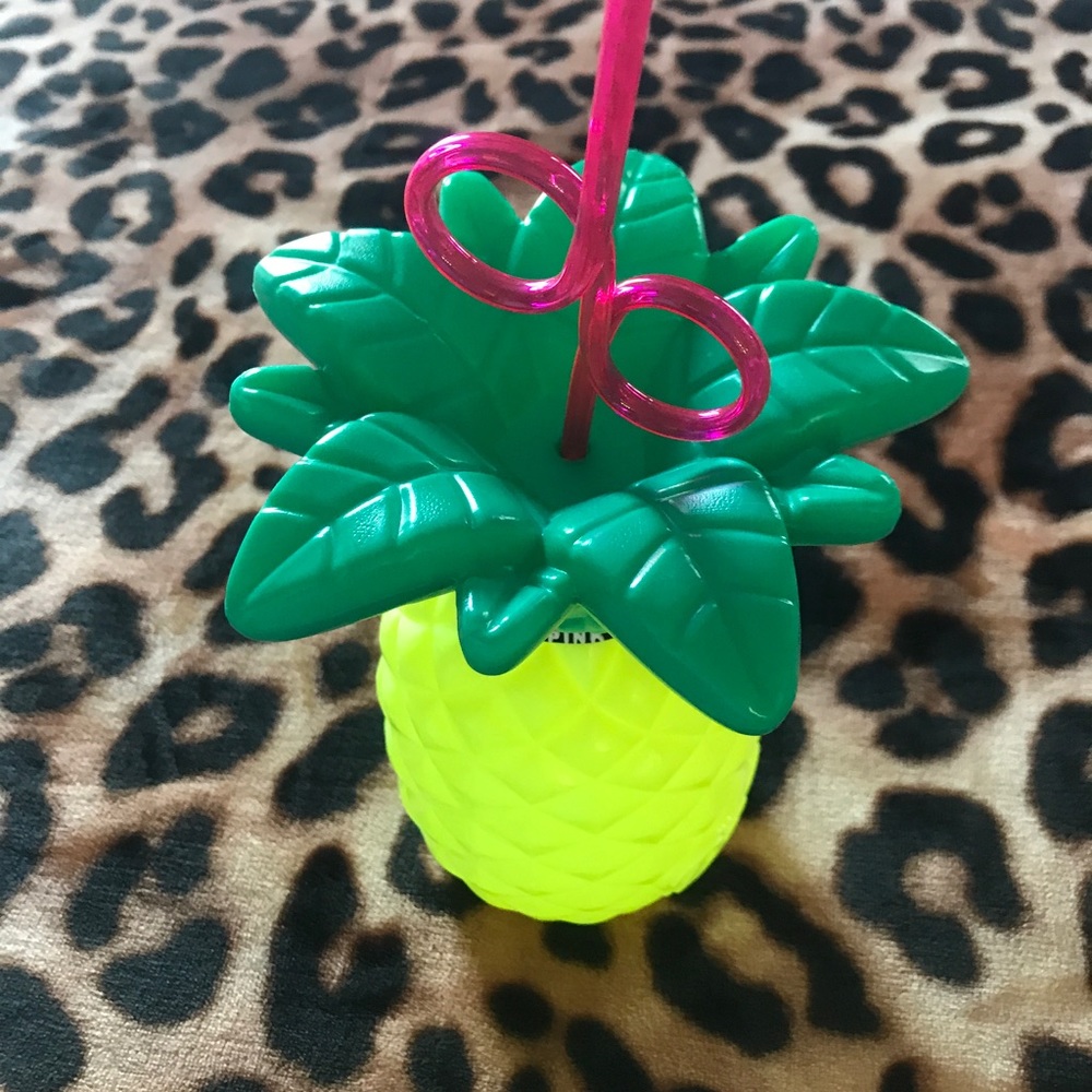 Vs pink pineapple drink bottle with straw
