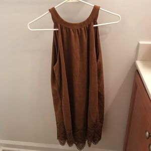 Brown dress with designs at the bottom.