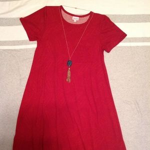 LuLaroe Carly red w/ subtle feathers - size XS