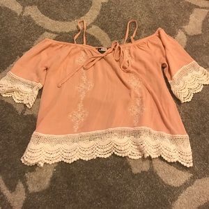 Cute peach colored off the shoulder crop top!