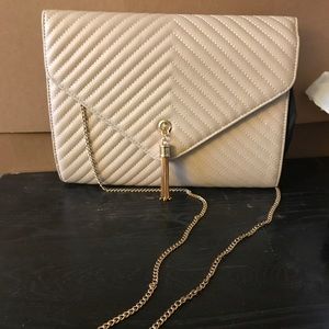 Tan and gold chain purse
