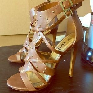 Brown and gold heels