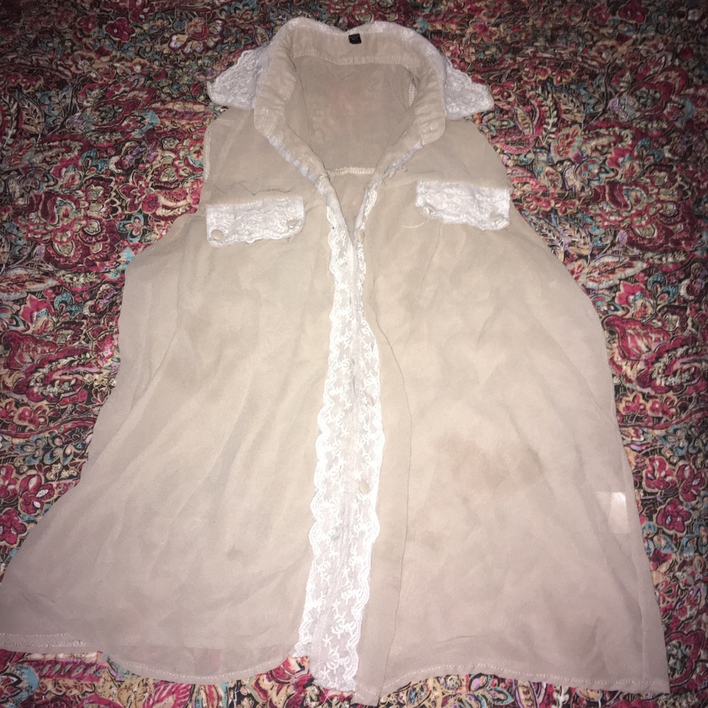 Beige and white sleeveless shirt