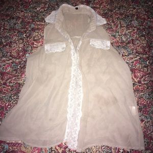 Beige and white sleeveless shirt