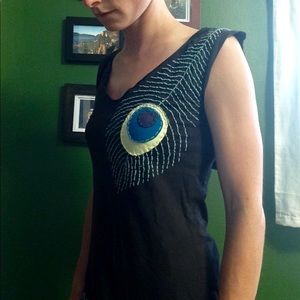 Synergy dress with peacock feathers